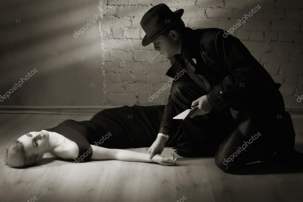 Detective investigating the crime scene Stock Photo by ©Demian 39725123