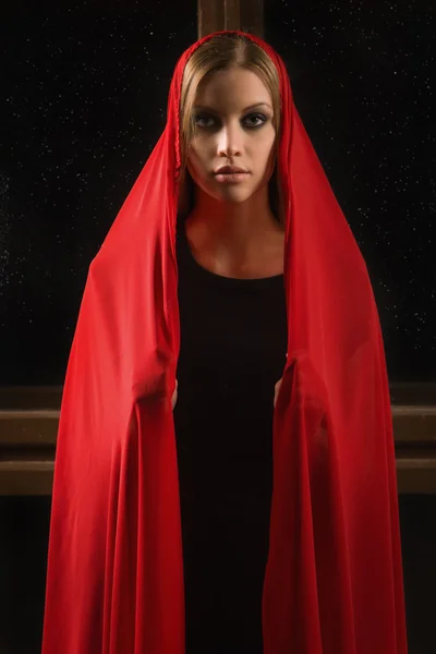 Girl in a red against the starry sky — Stock Photo, Image