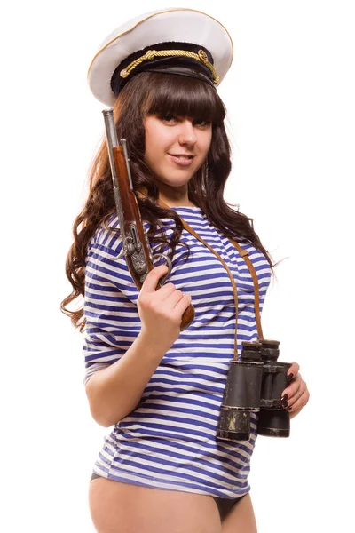 Mooie vrouw zeeman in pinup stijl met pistool — Stockfoto