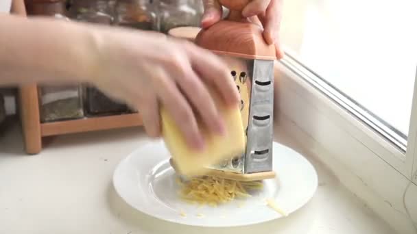 Man grating cheese for pizza, timelapse Video Clip. 