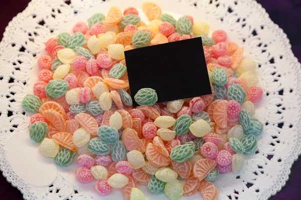 Candy background on the plate — Stock Photo, Image