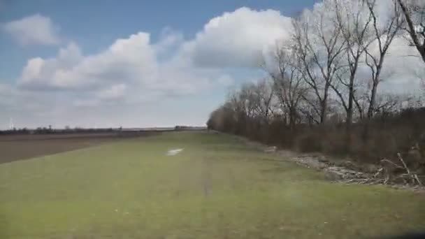 Paisaje rural vista desde tren en movimiento, Austria — Vídeos de Stock