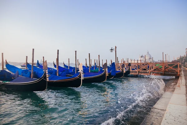 Venetian gondolas at sunrise — Stock Photo, Image