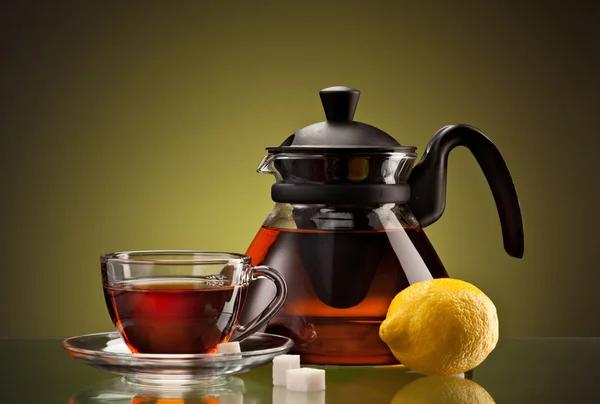 Tea cup and pot — Stock Photo, Image