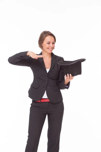 Business woman show magic on white — Stock Photo, Image