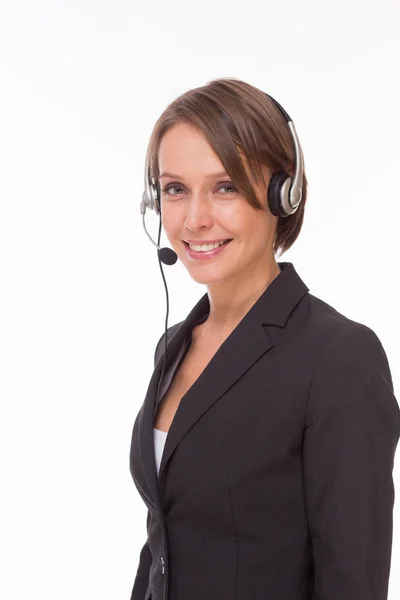 Mujer de negocios con auriculares en blanco —  Fotos de Stock