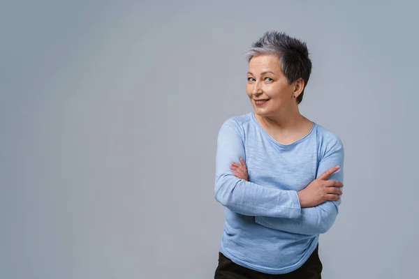 Challenging Look Positive Emotions Mature Grey Hair Woman Posing Hands — Stockfoto