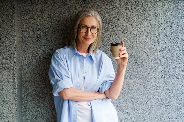 Charming Mature Grey Hair Woman Retirement Time Drink Coffee Using — Stok fotoğraf