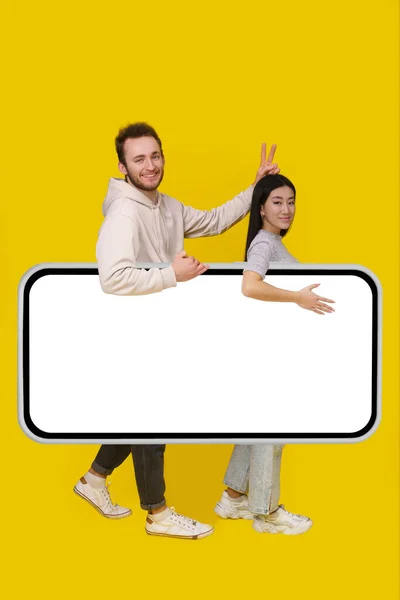 Carrying Huge Smartphone White Screen Handsome Guy Set Horns Gesture —  Fotos de Stock