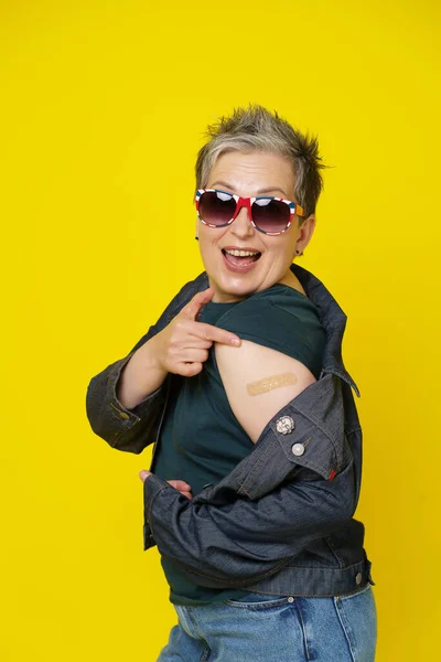 Happy Mature Grey Hair Woman Showing Shoulder Band Aid Having — Zdjęcie stockowe