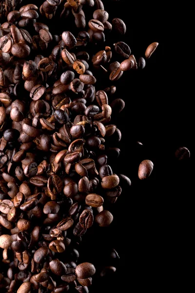 Létající kávová zrna — Stock fotografie