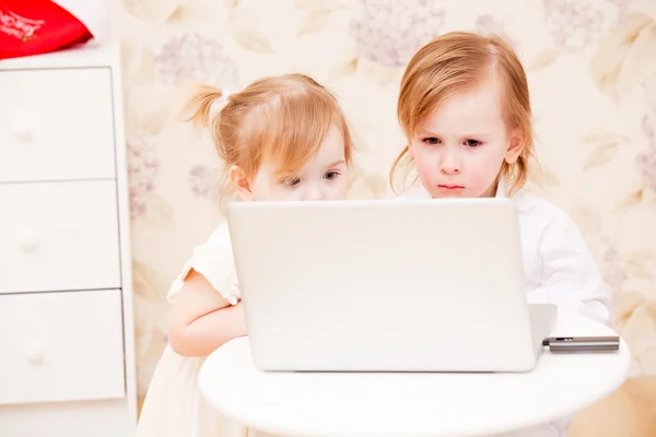 Children with laptop indoors. — Stock Photo, Image