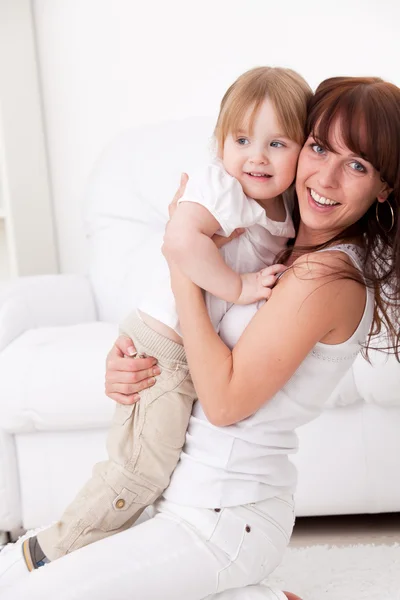 Mother and daughter at home — Stock Photo, Image