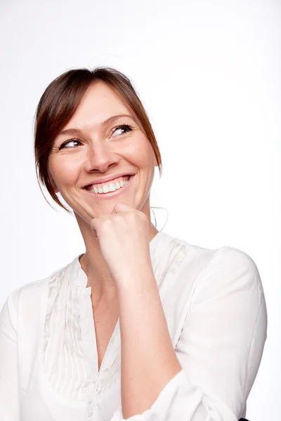 Pensando mulher sorrindo olhando para cima — Fotografia de Stock