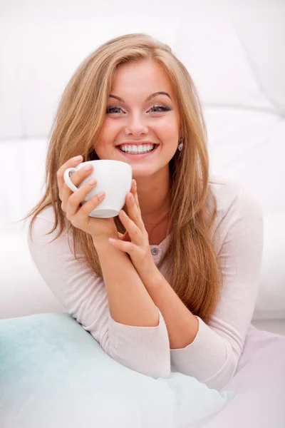 Woman holding white cup — Stock Photo, Image