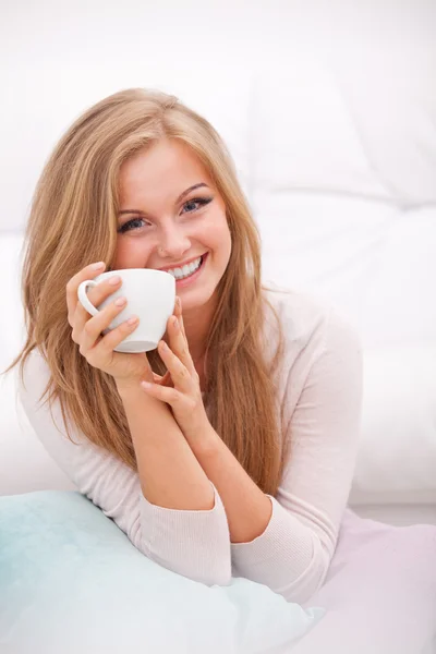 Woman holding white cup — Stock Photo, Image