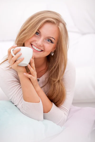 Woman holding white cup — Stock Photo, Image