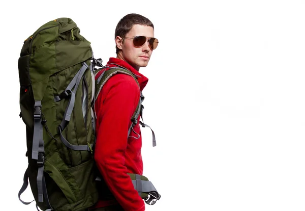 Hiker with backpack standing at white background — Stock Photo, Image