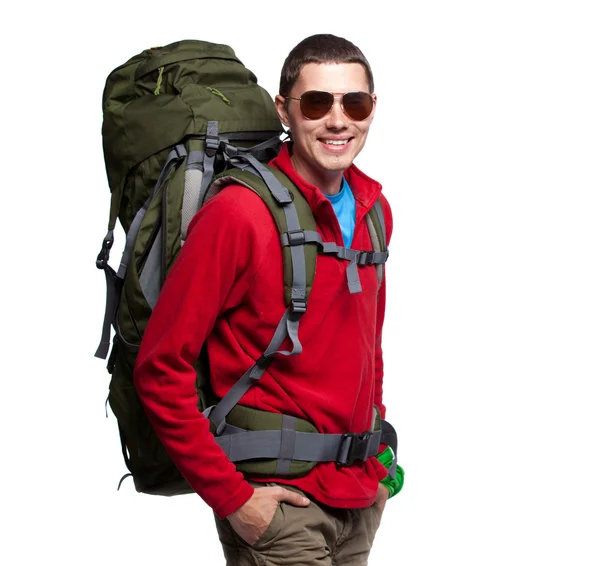 Hiker with backpack standing at white background — Stock Photo, Image