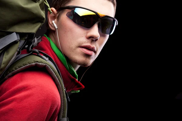 Young man with backpack walking — Stock Photo, Image