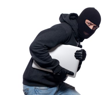 Thief stealing a laptop computer clipart
