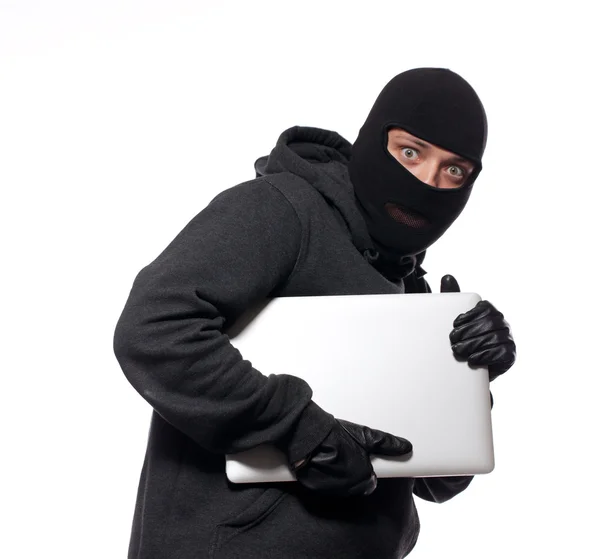 Złodziej kradzież laptopa — Zdjęcie stockowe