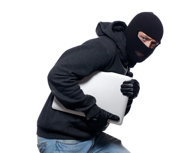 Dief stelen een laptopcomputer — Stockfoto