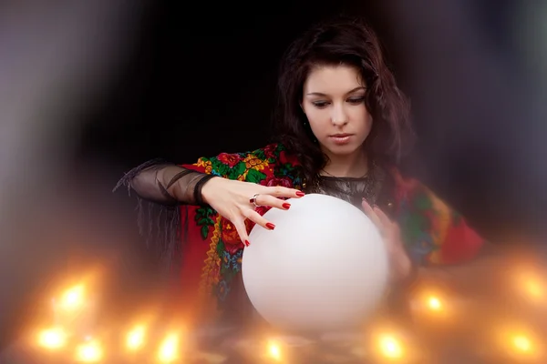 Witch with magic crystal ball — Stock Photo, Image