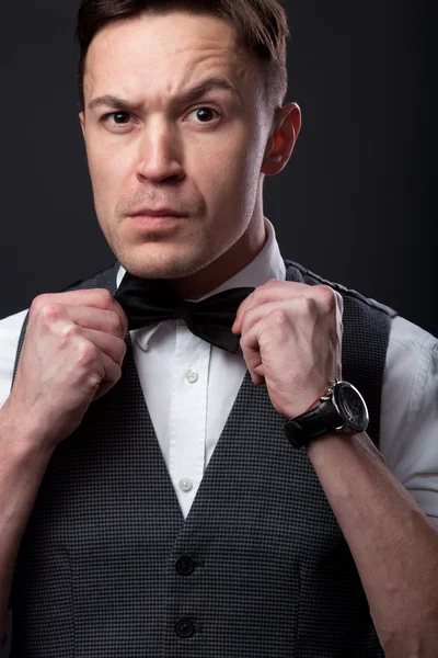 Young handsome man with bow tie — Stock Photo, Image