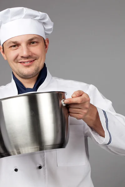 Cocinero cocinando con olla — Foto de Stock