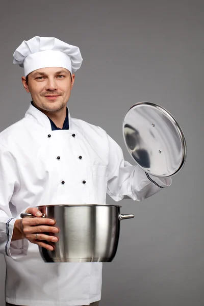 Chef cooking with pot — Stock Photo, Image