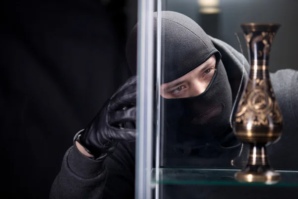 Burglar wearing black mask — Stock Photo, Image