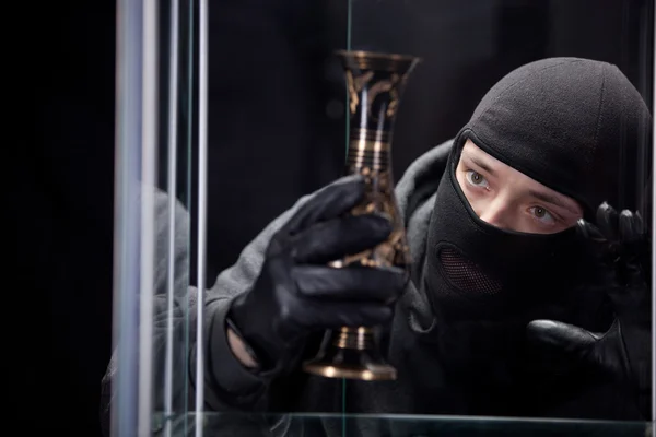 Burglar wearing black mask — Stock Photo, Image