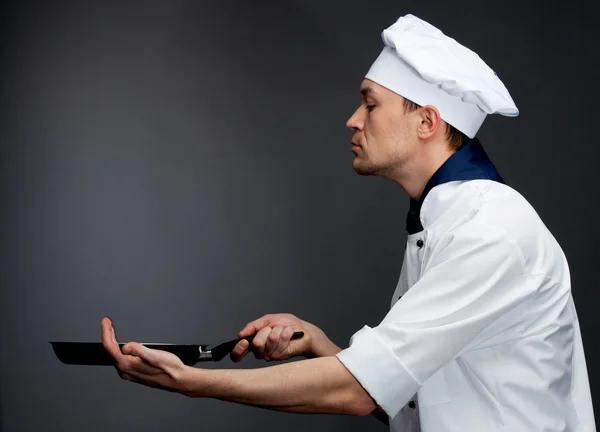 Chef holding pan — Stock Photo, Image