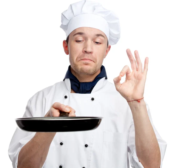 Повар держит сковородку — стоковое фото