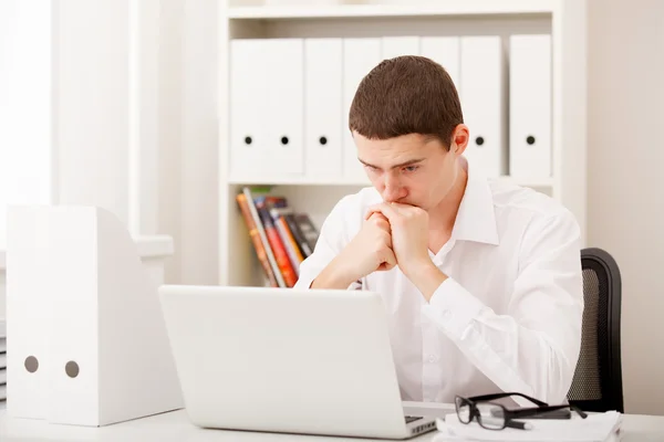 Man thinking in office — Stock Photo, Image