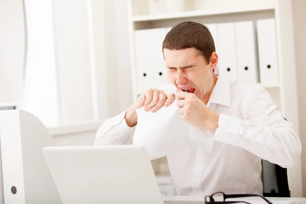 Angry man with document — Stock Photo, Image