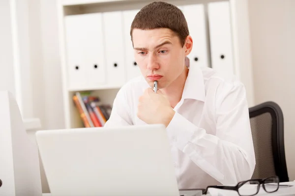 Man thinking in office — Stock Photo, Image