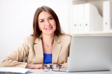 woman working on laptop clipart