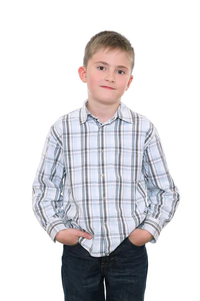 Satisfied boy keeps hands in pockets — Stock Photo, Image
