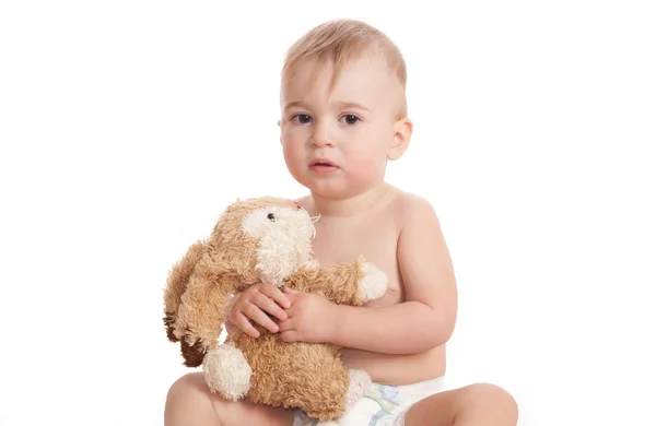 Bébé avec un jouet dans les mains — Photo