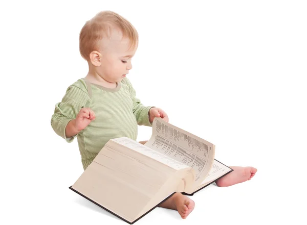 Baby with a big book — Stock Photo, Image
