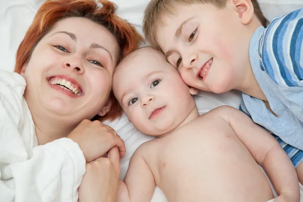 Woman with two children — Stock Photo, Image