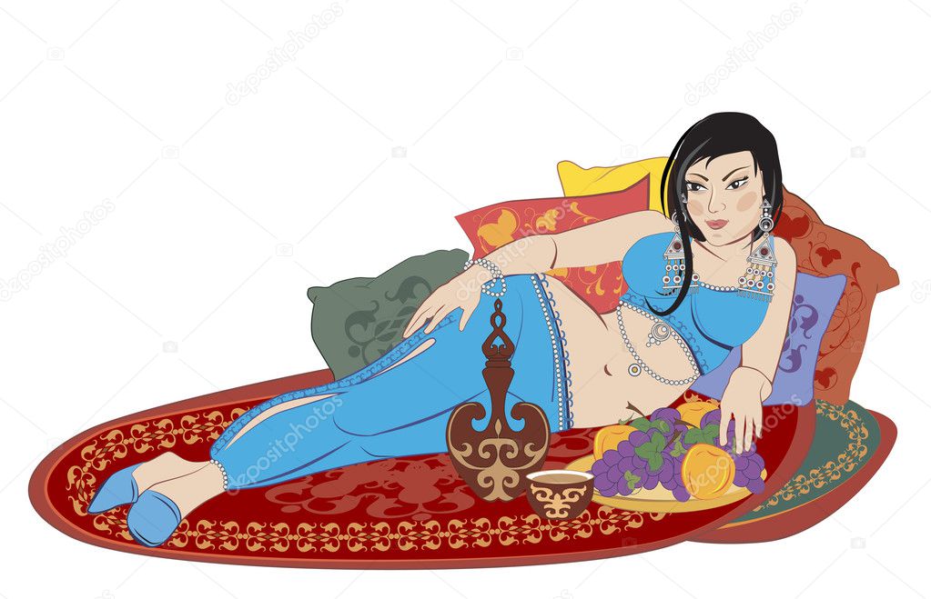 Beautiful Eastern woman lying on the carpet