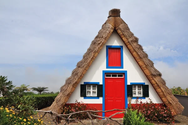 The red door and small windows — Stock Photo, Image