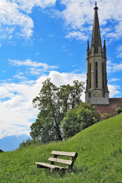 On a hillside is a cozy bench — Stock Photo, Image