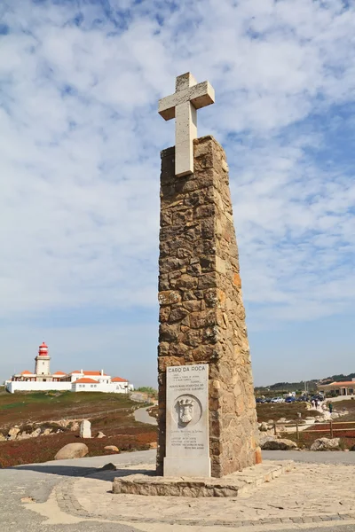 The lighthouse and obelisk with a large white cross — Stock Photo, Image