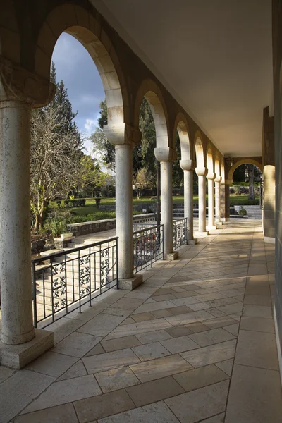 The colonnade in monastic to a garden — Stock Photo, Image