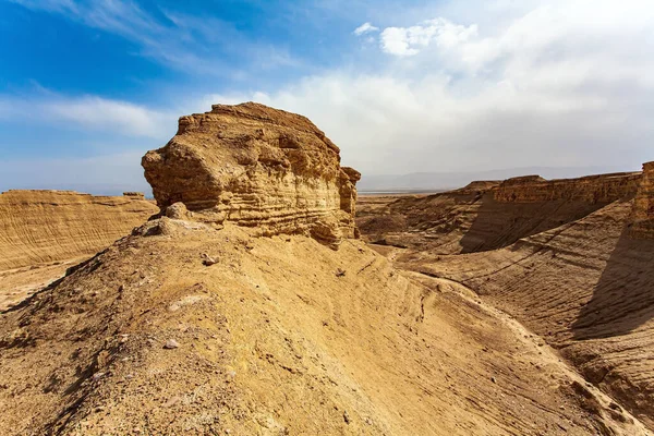 The Judean Desert. Ancient mountains and deserts around the Dead Sea. Israel. Interesting walk among picturesque hills, cliffs and gorges. Magnificent exotic resort for treatment.