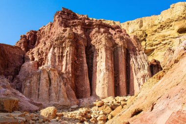 The Pillars of Amram.  Multicolored landscape formations. Bizarre forms of weathered sandstone in the Eilat Mountains. The rocks are composed of sandstones and volcanic rocks. Israel.